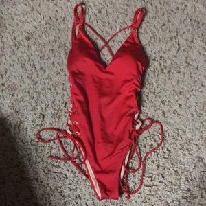 Lace up red swimsuit from PAC sun